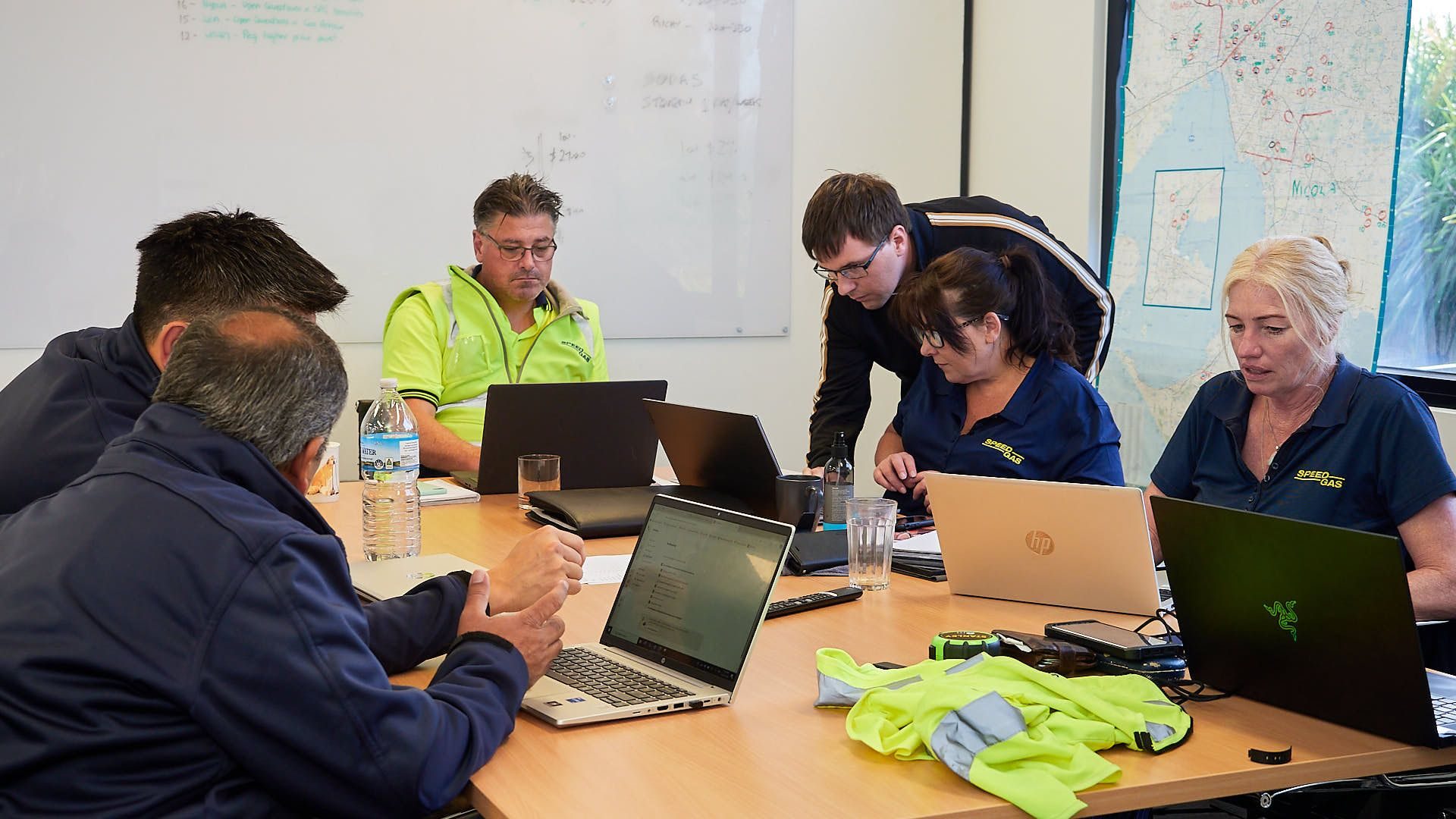 The Speed Gas team working together in a planning session